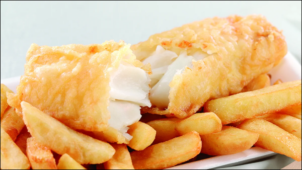 traditional fish and chips in a takeaway container